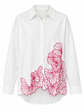 Oversized Shirt with Floral Embroidered Hem